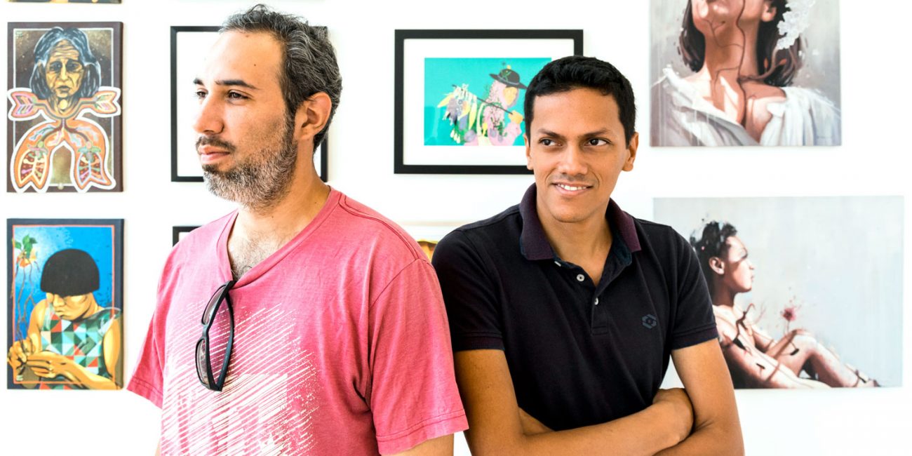 Felipe Ortiz, founder of the Fresco Exchange, left, and Jesus David Rodriguez of Grafica Mestiza stand in the community gallery at GALA, surrounded by art from artists of the Fresco Exchange. (Spenser R. Hasak) Felipe Ortiz, founder of the Fresco Exchange, left, and Jesus David Rodriguez of Grafica Mestiza stand in the community gallery at GALA, surrounded by art from artists of the Fresco Exchange. (Spenser R. Hasak)